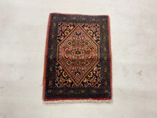 Tapis Oriental Noué à la