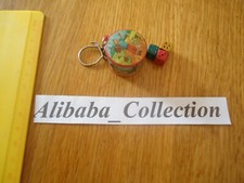 Porte Clé Tintin Boite Confiserie Brochet Bourbon bon état avec ses 3 dés