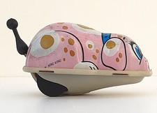 CHIEN SE BALANÇANT QUEUE TOURNANTE   ANCIEN JOUET MÉCANIQUE FONCTIONNE HONG KONG