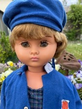 POUPEE NINA DE BELLA AUX YEUX NOISETTES DE 56 CM ECOLIERE