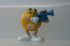 M&M'S TRES RARE FIGURINE MINI PASTILLE JAUNE TROMPETTE SERIE ORCHESTRE