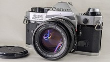 Reflex argentique Canon AE-1 Program + objectif Canon 1.4/50mm