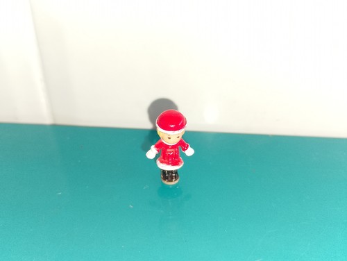 Polly pocket figurine doll