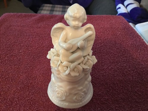 Ceramic white cherub playing - ceramic,