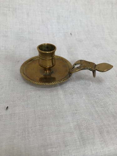 Bougeoir main bronze et - , en