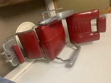 fauteuil de barbier rouge en