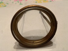 entourage bronze et carreau
