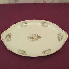 Plat à gâteaux en porcelaine de Limoges décor d'un pêcheur - lot 6