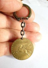 Ancien porte clé Mobil Pégase Huile Moteur Carburant Garage Automobile 1866-1966