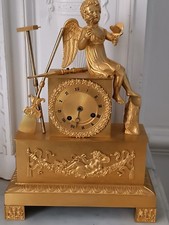 Superbe pendule en bronze doré amour jardinier