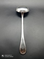 Louche en métal argenté