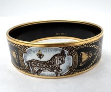 Bracelet Hermès émail cloisonné noir et doré motifs équestres