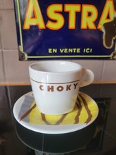 Tasse sous soucoupe - et,