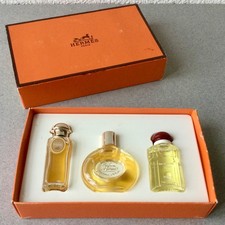 Coffret de 3 FLACONS MINIATURES d’ eau de toilette HERMES . Jamais servi.