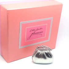 ESTE LAUDER CONCRETE PARFUM SOLIDE PETIT SAC ARGENT AVEC STRASS ROSE Plein boite