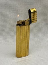 Cartier must briquet plaqué - cartier,