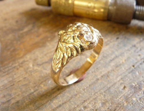 Bague tête de - or,
