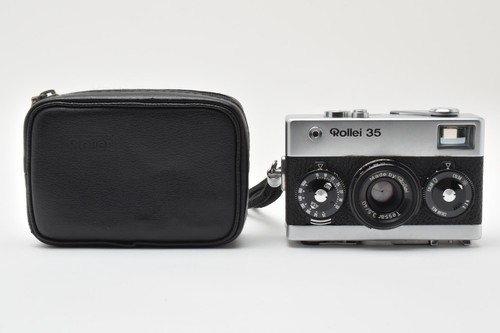 Read near mint rollei - ],