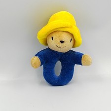 Peluche hochet ours Paddington Bear manteau bleu chapeau jaune EDEN - 34988