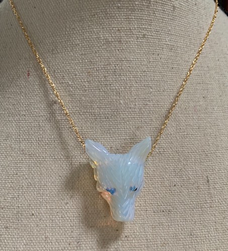 Pendentif tete loup en - de,