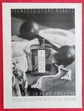 Publicité de presse: Parfum POUR UN HOMME de CARON Laisse la Peau Fraîche 1953