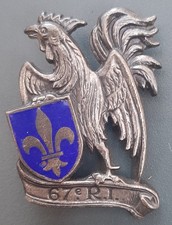 Insigne émail ancien 67° RI