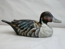 canard en bois sculpté et