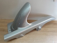UN LECHE ROUE GARDE BOUE