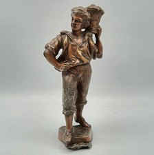 Sujet sclupture en régule patiné cuivré formant jeune vendangeur début XXème