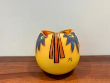 Ancien vase boule signé