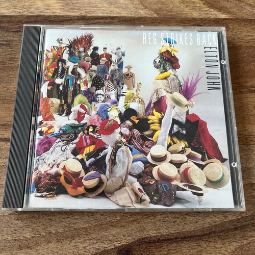 Elton john reg strikes - elton,
