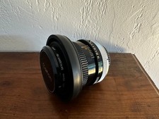 Objectif Canon FD 50mm 1,8 SC + Pare soleil souple HOYA