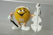 M&M'S TRES RARE FIGURINE MINI PASTILLE JAUNE AU VIOLONCELLE SERIE ORCHESTRE