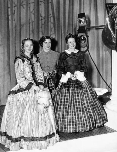 Three young debutantes pose