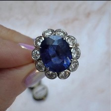 Bague halo saphir bleu et
