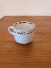Une tasse vintage café Conti porcelaine blanche liseré d'or 5x6 cm