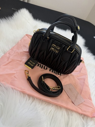 Sac main miu - main,