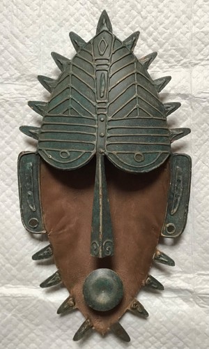 Vintage tribal art metal wall