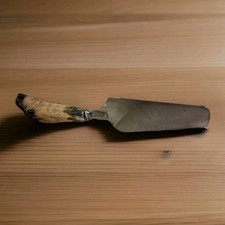 Pelle à Gâteau Manche Patte