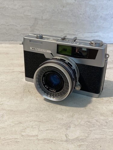 Petri film camera with - petri,