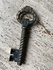 ANCIEN TIRE BOUCHON EN BRONZE