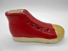 ANCIENNE TIRELIRE  PUBLICITAIRE CHAUSSURE / BASKET SUPER STAR EN CÉRAMIQUE