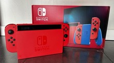 Nintendo Switch Edition Limitée Mario (Rouge et Bleu) -FR