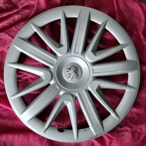 Enjoliveur peugeot 15 - un,