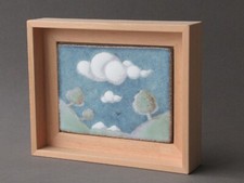  Petit cadre d'un carreau en grès émaillé , décor paysage avec arbres et nuages