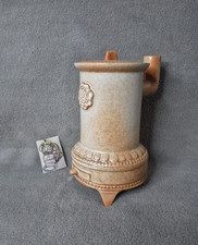 Petit poêle à bois décoratif en terre cuite 