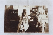 Carte photo, leçon de piano