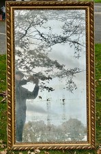 Grand miroir ancien doré Bois et stuc godrons miroir partielement dé-mercurisé