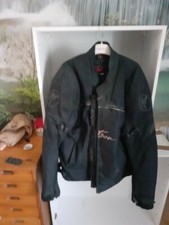 blouson moto coqué doublure legerement brulé en bas de marque mitsou taille XXL