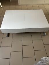 table basse design blanc laqué se transforme en table salle a manger  à débattre
